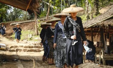 a group of women wearing hats