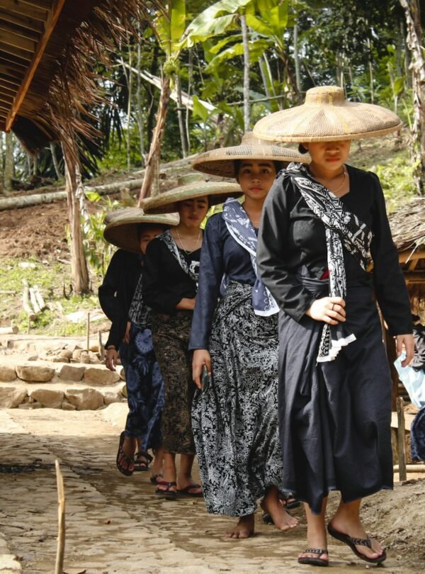 a group of women wearing hats