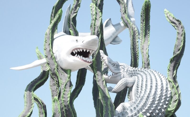 shark and crocodile statue