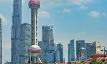 A view of a city skyline from a bridge