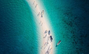 An aerial view of a small island in the middle of the ocean