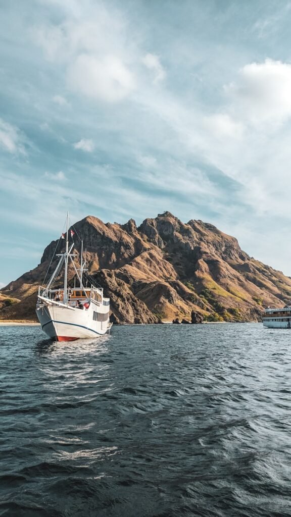 a boat floating on top of a large body of water