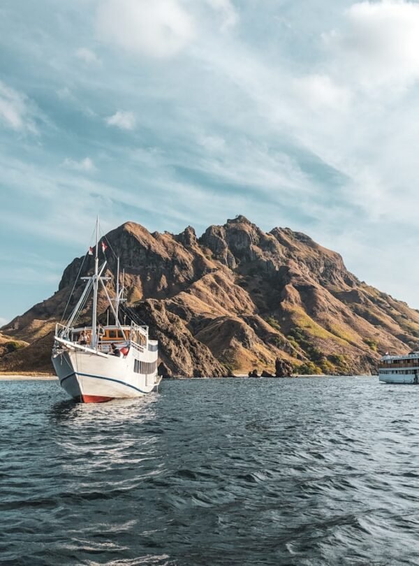 a boat floating on top of a large body of water