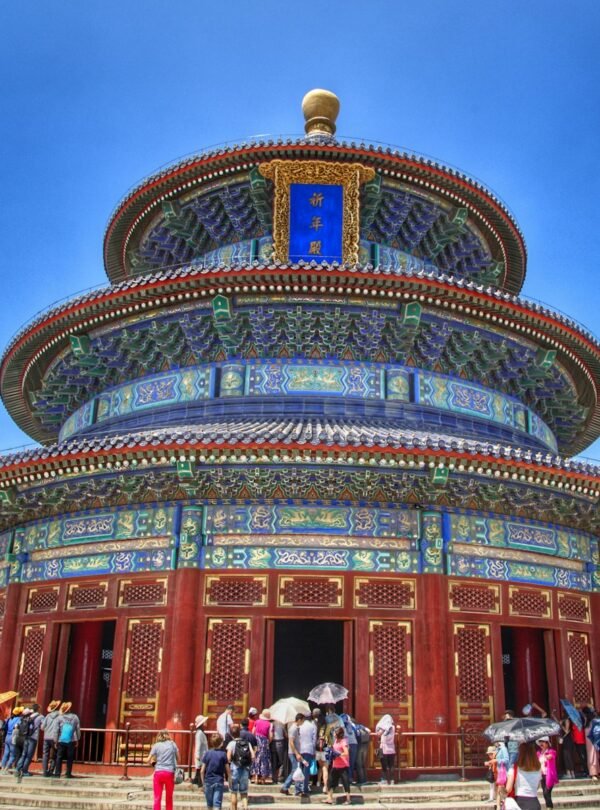 a group of people standing in front of a building