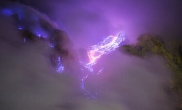 purple and white smoke on sky